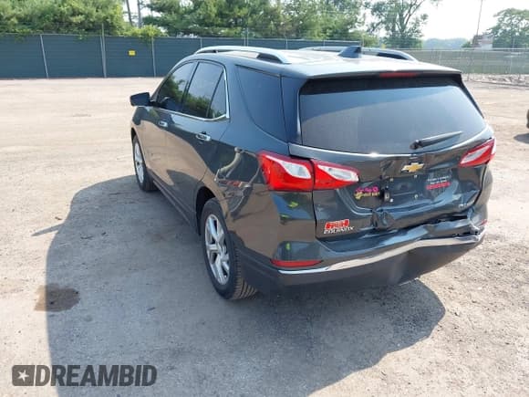 ✅ 2019 Chevrolet Equinox Premier • VIN: 2GNAXNEV4K6184569 • Lot: 42670537. Listed on IAAI with 163,594 mi. Free auction sales archive from the USA and detailed vehicle history report at DreamBid. Image 3.