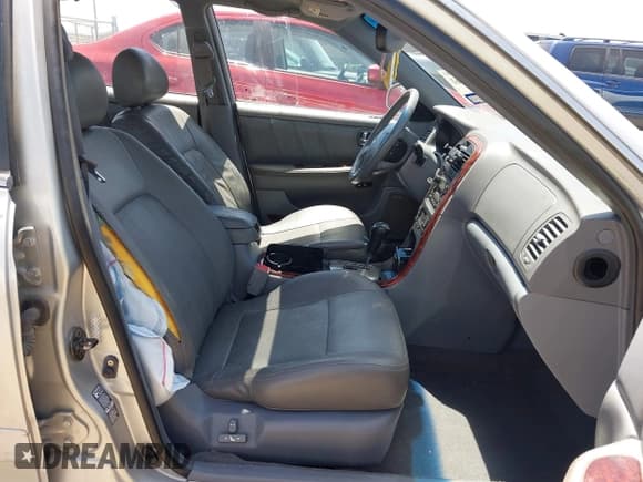 ✅ 2006 Kia Optima LX • VIN: KNAGD128565461652 • Лот: 42866461. Опубликован ранее на IAAI с пробегом 68 060 миль. Бесплатный доступ к архиву аукционных продаж из США и подробный отчёт об истории автомобиля на DreamBid. Изображение 5.