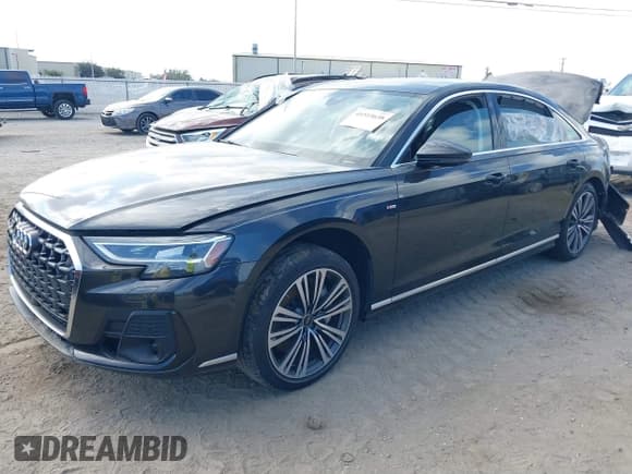 ✅ 2022 Audi A8 • VIN: WAULDAF87NN001657 • Lot: 41515638. Wystawiony na IAAI z przebiegiem 22 377 mil. Bezpłatny archiwum sprzedaży aukcyjnych z USA i szczegółowy raport historii pojazdu na DreamBid. Zdjęcie 2.