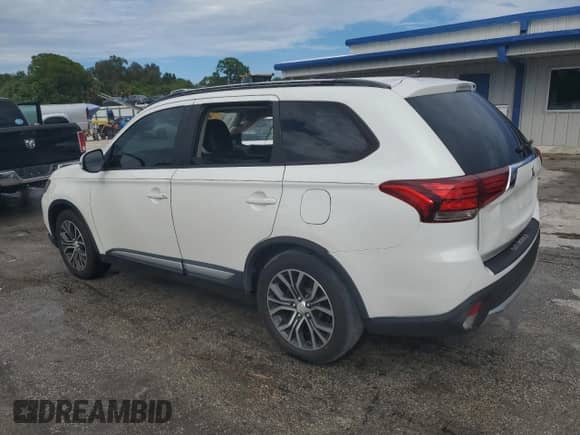 2016 Mitsubishi Outlander SE z VIN JA4AD3A34GZ054565, wystawiony jako Copart lot #84243245 z przebiegiem 126 920 mil mil oraz Szkoda całkowita • Salvage title. Historia ofert i sprzedaży dostępna na DreamBid. Obrazek 2.
