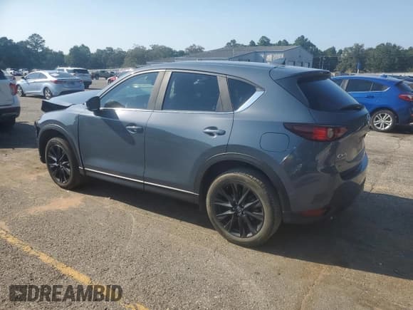 ✅ 2021 Mazda CX-5 Carbon Edition • VIN: JM3KFBCY7M0453842 • Лот: 84977175. Опубликован ранее на Copart с пробегом 50 274 миль. Бесплатный доступ к архиву аукционных продаж из США и подробный отчёт об истории автомобиля на DreamBid. Изображение 2.