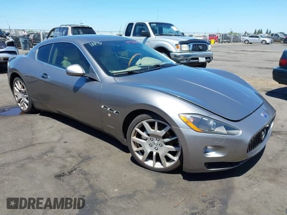 ✅ 2009 Maserati GranTurismo • VIN: ZAMGJ45A690042878 • Lot: 41411767. Listed on IAAI with Not provided. Free auction sales archive from the USA and detailed vehicle history report at DreamBid. Image 1.