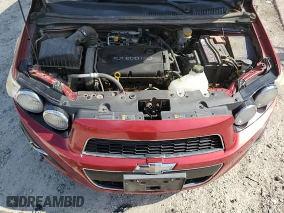 2012 Chevrolet Sonic LT z VIN 1G1JC5SH3C4185338, wystawiony jako Copart lot #65351364 z przebiegiem 90 564 mil mil oraz Czysty tytuł • Clean title. Historia ofert i sprzedaży dostępna na DreamBid. Obrazek 11.