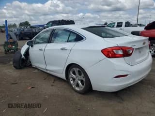 ✅ 2017 Chevrolet Cruze Premier • VIN: 1G1BF5SM3H7237257 • Lot: 60329633. Listed on Copart with 106,037 mi. Free auction sales archive from the USA and detailed vehicle history report at DreamBid. Image 2.