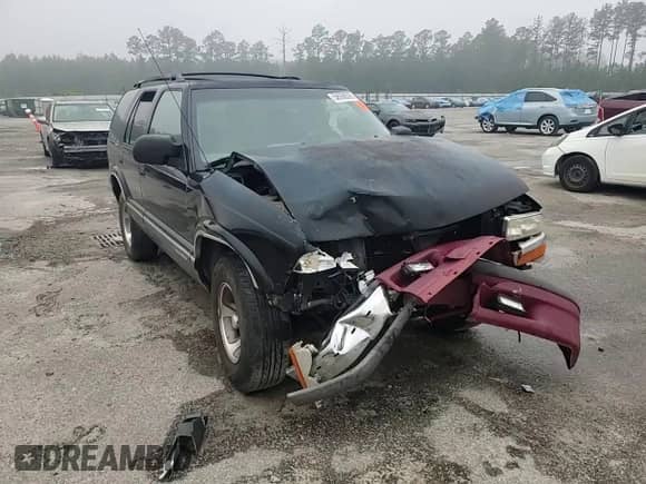 1995 Chevrolet Blazer z VIN 1GNCS13W5S2165022, wystawiony jako Copart lot #58006505 z przebiegiem 318 061 mil mil oraz Szkoda całkowita • Salvage title. Historia ofert i sprzedaży dostępna na DreamBid. Obrazek 14.