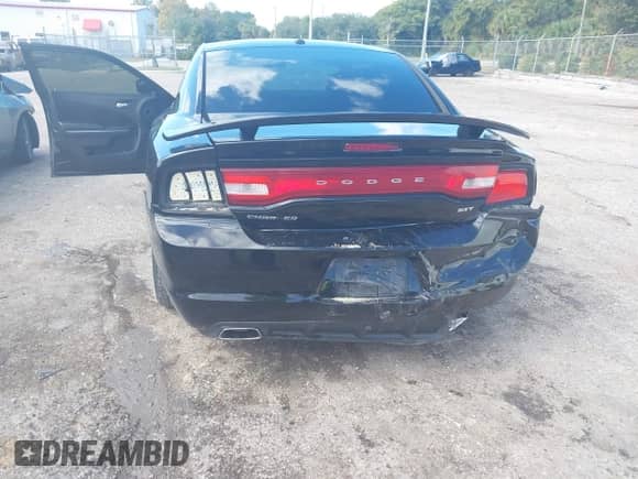 2014 Dodge Charger SXT с VIN 2C3CDXHG0EH358878, выставлен на аукционе IAAI как лот 43459921 с пробегом 212 249 миль миль и . История ставок и продаж доступна на DreamBid. Изображение 6.