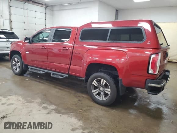 ✅ 2015 GMC Canyon 2WD SLE • VIN: 1GTG5BE36F1121312 • Лот: 66870045. Опубликован ранее на Copart с пробегом 152 632 миль. Бесплатный доступ к архиву аукционных продаж из США и подробный отчёт об истории автомобиля на DreamBid. Изображение 2.
