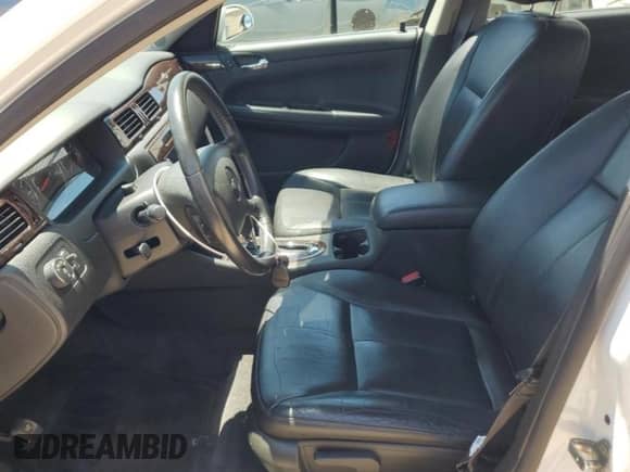 2012 Chevrolet Impala LTZ z VIN 2G1WC5E38C1292774, wystawiony jako Copart lot #63310415 z przebiegiem 153 804 mil mil oraz Szkoda całkowita • Salvage title. Historia ofert i sprzedaży dostępna na DreamBid. Obrazek 7.