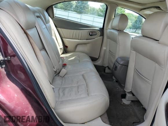 ✅ 2003 Oldsmobile Aurora • VIN: 1G3GS64C134163544 • Lot: 58706705. Listed on Copart with 104,447 mi. Free auction sales archive from the USA and detailed vehicle history report at DreamBid. Image 10.