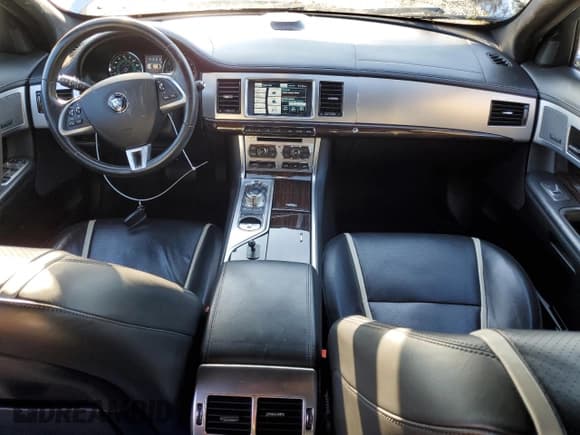 ✅ 2015 Jaguar XF Portfolio • VIN: SAJWA0F7XF8U51105 • Lot: 82865814. Listed on Copart with 62,807 mi. Free auction sales archive from the USA and detailed vehicle history report at DreamBid. Image 8.