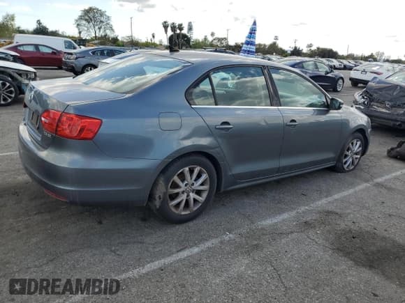 ✅ 2013 Volkswagen Jetta SE • VIN: 3VWDP7AJ8DM360372 • Lot: 51796725. Listed on Copart with 66,981 mi. Free auction sales archive from the USA and detailed vehicle history report at DreamBid. Image 3.