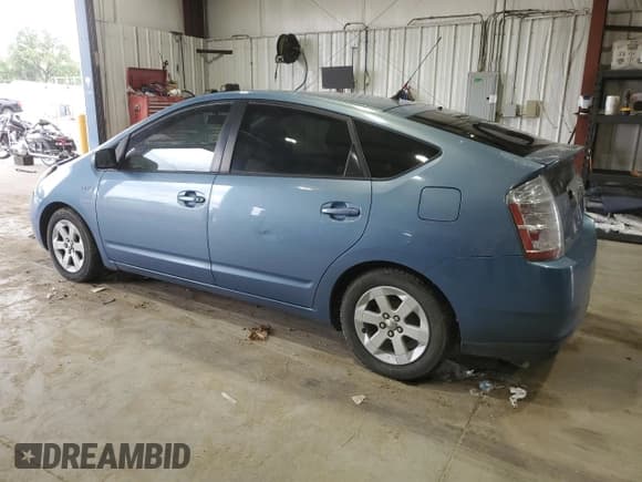 ✅ 2006 Toyota Prius • VIN: JTDKB20U867067043 • Лот: 66025085. Опубликован ранее на Copart с пробегом 163 248 миль. Бесплатный доступ к архиву аукционных продаж из США и подробный отчёт об истории автомобиля на DreamBid. Изображение 2.