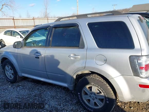 2010 Mercury Mariner z VIN 4M2CN8B73AKJ15604, wystawiony jako IAAI lot #41454647 z przebiegiem 170 761 mil mil oraz . Historia ofert i sprzedaży dostępna na DreamBid. Obrazek 14.