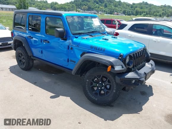 ✅ 2022 Jeep Wrangler Unlimited Willys Sport • VIN: 1C4HJXDM6NW141603 • Lot: 42687693. Wystawiony na IAAI z przebiegiem 37 180 mil. Bezpłatny archiwum sprzedaży aukcyjnych z USA i szczegółowy raport historii pojazdu na DreamBid. Zdjęcie 1.