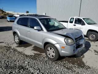 2007 Hyundai Tucson SE with VIN KM8JN72D07U606685, listed as a Copart auction lot 87243795 with 158,114 mi miles and Salvage title. Bid and sale history available at DreamBid. Image 4.