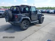 ✅ 2014 Jeep Wrangler Sahara • VIN: 1C4GJWBG0EL240812 • Lot: 42812932. Listed on IAAI with 130,313 mi. Free auction sales archive from the USA and detailed vehicle history report at DreamBid. Image 4.