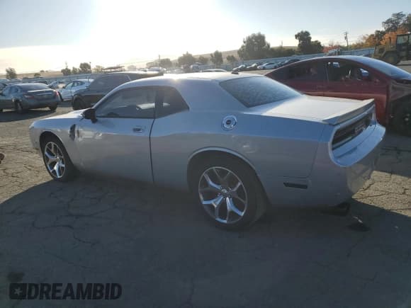 ✅ 2009 Dodge Challenger SE • VIN: 2B3LJ44VX9H522894 • Lot: 81184364. Wystawiony na Copart z przebiegiem 129 069 mil. Bezpłatny archiwum sprzedaży aukcyjnych z USA i szczegółowy raport historii pojazdu na DreamBid. Zdjęcie 2.
