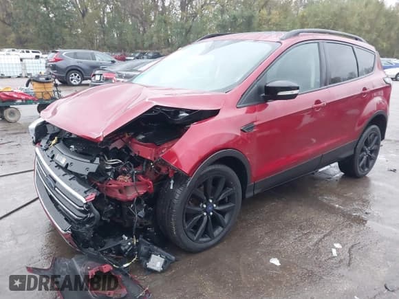 ✅ 2017 Ford Escape Titanium • VIN: 1FMCU9J95HUB71054 • Lot: 43517492. Listed on IAAI with 163,617 mi. Free auction sales archive from the USA and detailed vehicle history report at DreamBid. Image 2.