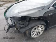 ✅ 2021 Tesla Model X Long Range Plus • VIN: 5YJXCBE27MF324792 • Lot: 41898704. Listed on IAAI with 50,433 mi. Free auction sales archive from the USA and detailed vehicle history report at DreamBid. Image 19.