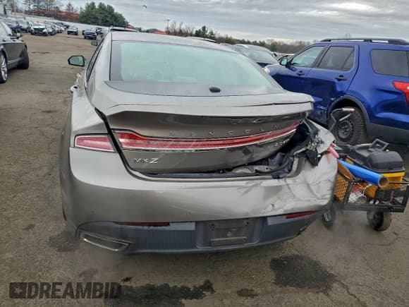 ✅ 2015 Lincoln MKZ • VIN: 3LN6L2J92FR628334 • Lot: 93039845. Wystawiony na Copart z przebiegiem 119 863 mil. Bezpłatny archiwum sprzedaży aukcyjnych z USA i szczegółowy raport historii pojazdu na DreamBid. Zdjęcie 6.