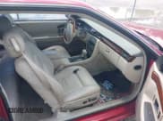 ✅ 2001 Cadillac Eldorado ESC • VIN: 1G6EL12Y31B107932 • Lot: 42723296. Wystawiony na IAAI z przebiegiem 152 482 mil. Bezpłatny archiwum sprzedaży aukcyjnych z USA i szczegółowy raport historii pojazdu na DreamBid. Zdjęcie 5.