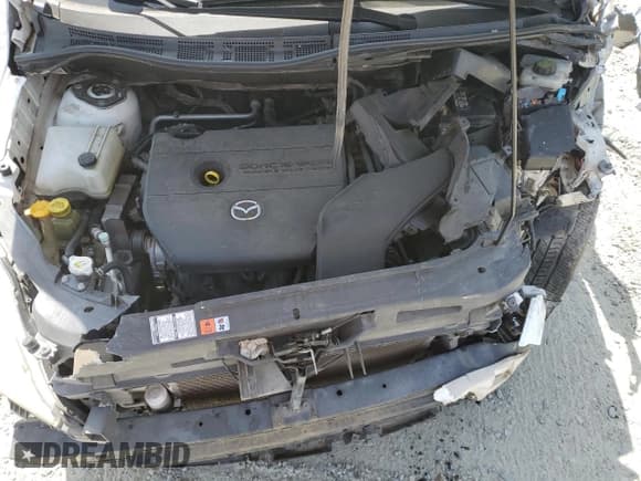 ✅ 2010 Mazda 5 Sport • VIN: JM1CR2WLXA0364086 • Лот: 54380125. Опубликован ранее на Copart с пробегом 184 973 миль. Бесплатный доступ к архиву аукционных продаж из США и подробный отчёт об истории автомобиля на DreamBid. Изображение 12.