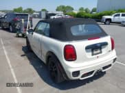 ✅ 2021 MINI Convertible • VIN: WMWWJ9C0XM3M07302 • Lot: 42027854. Listed on IAAI with 30,921 mi. Free auction sales archive from the USA and detailed vehicle history report at DreamBid. Image 3.