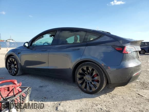 ✅ 2022 Tesla Model Y Performance • VIN: 7SAYGDEFXNF517160 • Lot: 92797085. Listed on Copart with 26,777 mi. Free auction sales archive from the USA and detailed vehicle history report at DreamBid. Image 2.