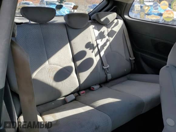 2009 Hyundai Accent Auto GS z VIN KMHCM36C19U127295, wystawiony jako Copart lot #79997944 z przebiegiem 236 362 mil mil oraz Szkoda całkowita • Salvage title. Historia ofert i sprzedaży dostępna na DreamBid. Obrazek 10.