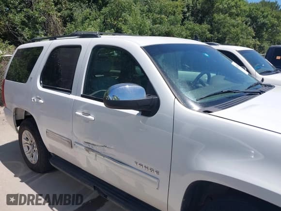 ✅ 2014 Chevrolet Tahoe LT • VIN: 1GNSCBE03ER213054 • Lot: 42821489. Listed on IAAI with 166,689 mi. Free auction sales archive from the USA and detailed vehicle history report at DreamBid. Image 13.