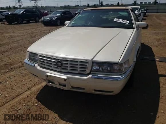 ✅ 1998 Cadillac Eldorado Touring • VIN: 1G6ET1298WU606293 • Lot: 68511745. Listed on Copart with 48,592 mi. Free auction sales archive from the USA and detailed vehicle history report at DreamBid. Image 13.