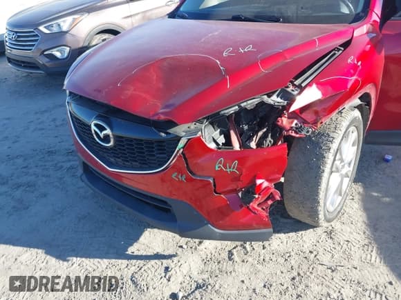 ✅ 2015 Mazda CX-5 Grand Touring • VIN: JM3KE2DY8F0491553 • Lot: 43513318. Wystawiony na IAAI z przebiegiem 180 774 mil. Bezpłatny archiwum sprzedaży aukcyjnych z USA i szczegółowy raport historii pojazdu na DreamBid. Zdjęcie 6.