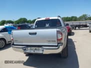 ✅ 2010 Toyota Tacoma PreRunner • VIN: 3TMJU4GN3AM098103 • Lot: 41981209. Listed on IAAI with 218,329 mi. Free auction sales archive from the USA and detailed vehicle history report at DreamBid. Image 16.