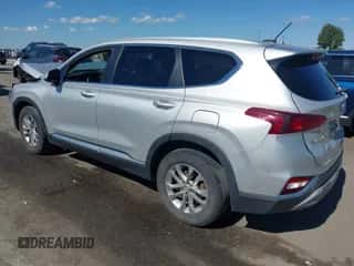 2019 Hyundai Santa Fe SE z VIN 5NMS23AD4KH100188, wystawiony jako IAAI lot #43374582 z przebiegiem 88 759 mil mil oraz . Historia ofert i sprzedaży dostępna na DreamBid. Obrazek 3.