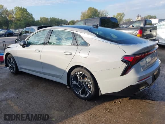 ✅ 2025 Kia K5 GT-Line • VIN: KNAG64J79S5297028 • Lot: 43449999. Wystawiony na IAAI z przebiegiem 24 566 mil. Bezpłatny archiwum sprzedaży aukcyjnych z USA i szczegółowy raport historii pojazdu na DreamBid. Zdjęcie 3.