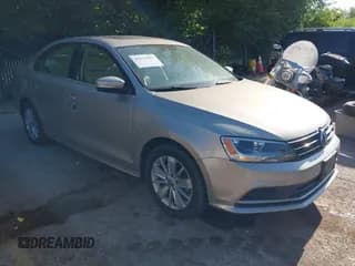 ✅ 2015 Volkswagen Jetta SE • VIN: 3VWD07AJ5FM318913 • Лот: 42671952. Опубликован ранее на IAAI с пробегом 120 169 миль. Бесплатный доступ к архиву аукционных продаж из США и подробный отчёт об истории автомобиля на DreamBid. Изображение 1.
