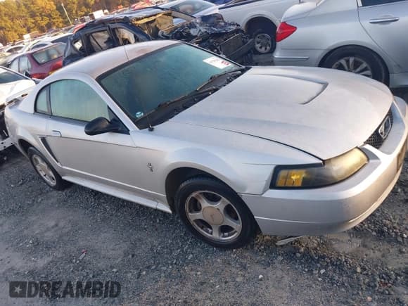 ✅ 2003 Ford Mustang Standard • VIN: 1FAFP40483F336213 • Lot: 43780203. Wystawiony na IAAI z przebiegiem 102 274 mil. Bezpłatny archiwum sprzedaży aukcyjnych z USA i szczegółowy raport historii pojazdu na DreamBid. Zdjęcie 1.