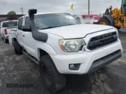 ✅ 2014 Toyota Tacoma PreRunner • VIN: 3TMJU4GN3EM164400 • Lot: 43281799. Listed on IAAI with 79,505 mi. Free auction sales archive from the USA and detailed vehicle history report at DreamBid. Image 1.