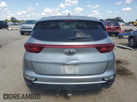 ✅ 2021 Kia Sportage LX • VIN: KNDPM3AC8M7942680 • Lot: 87074205. Listed on Copart with 114,256 mi. Free auction sales archive from the USA and detailed vehicle history report at DreamBid. Image 6.