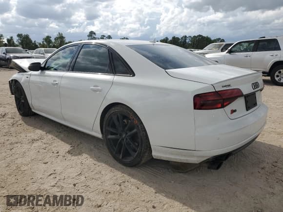 ✅ 2016 Audi S8 Plus • VIN: WUAJ5AFD9GN900790 • Lot: 64053684. Listed on Copart with 62,669 mi. Free auction sales archive from the USA and detailed vehicle history report at DreamBid. Image 2.