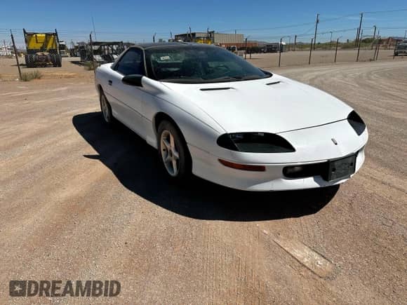 1997 Chevrolet Camaro z VIN 2G1FP22KXV2124842, wystawiony jako Copart lot #59028955 z przebiegiem 63 763 mil mil oraz Czysty tytuł • Clean title. Historia ofert i sprzedaży dostępna na DreamBid. Obrazek 1.