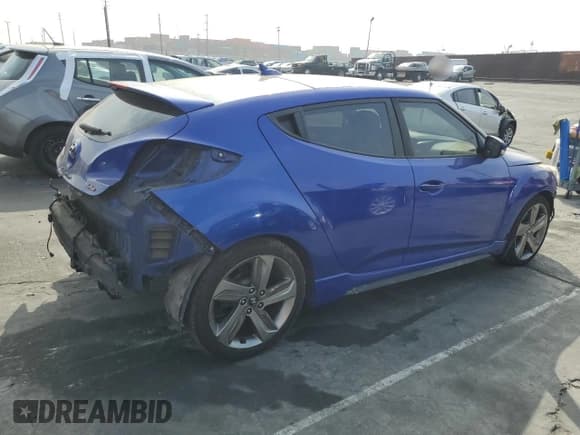 ✅ 2014 Hyundai Veloster Turbo • VIN: KMHTC6AE6EU190402 • Lot: 72744104. Wystawiony na Copart z przebiegiem 147 966 mil. Bezpłatny archiwum sprzedaży aukcyjnych z USA i szczegółowy raport historii pojazdu na DreamBid. Zdjęcie 3.