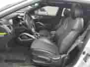 2016 Hyundai Veloster z VIN KMHTC6AD0GU302234, wystawiony jako Copart lot #72372854 z przebiegiem 89 373 mil mil oraz Szkoda całkowita • Salvage title. Historia ofert i sprzedaży dostępna na DreamBid. Obrazek 7.