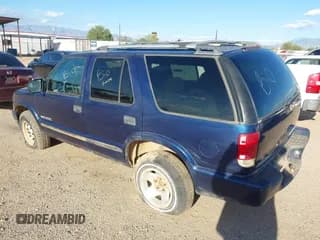 ✅ 2002 Chevrolet Blazer LS • VIN: 1GNDT13W82K101185 • Lot: 43332635. Wystawiony na IAAI z przebiegiem 130 604 mil. Bezpłatny archiwum sprzedaży aukcyjnych z USA i szczegółowy raport historii pojazdu na DreamBid. Zdjęcie 3.
