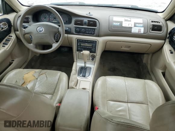 ✅ 2002 Mazda 626 LX • VIN: 1YVGF22D225285499 • Lot: 53693055. Listed on Copart with 144,812 mi. Free auction sales archive from the USA and detailed vehicle history report at DreamBid. Image 8.