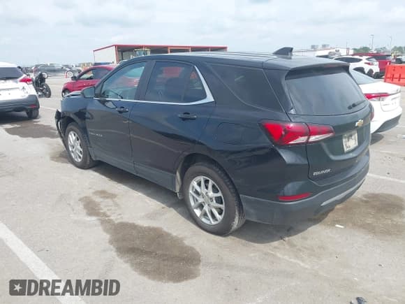 ✅ 2023 Chevrolet Equinox LT • VIN: 3GNAXUEG6PL211284 • Lot: 42869723. Listed on IAAI with 67,376 mi. Free auction sales archive from the USA and detailed vehicle history report at DreamBid. Image 3.