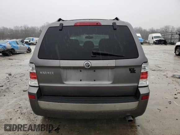 2009 Mercury Mariner z VIN 4M2CU81G39KJ17532, wystawiony jako Copart lot #43907455 z przebiegiem 214 212 mil mil oraz Szkoda całkowita • Salvage title. Historia ofert i sprzedaży dostępna na DreamBid. Obrazek 6.