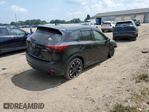 ✅ 2016 Mazda CX-5 Grand Touring • VIN: JM3KE4DYXG0613200 • Lot: 67213445. Listed on Copart with 105,864 mi. Free auction sales archive from the USA and detailed vehicle history report at DreamBid. Image 3.