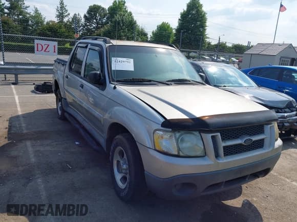 ✅ 2004 Ford Explorer Sport Trac XLS • VIN: 1FMZU67K64UA90304 • Лот: 42429791. Опубликован ранее на IAAI с пробегом Не указан. Бесплатный доступ к архиву аукционных продаж из США и подробный отчёт об истории автомобиля на DreamBid. Изображение 1.