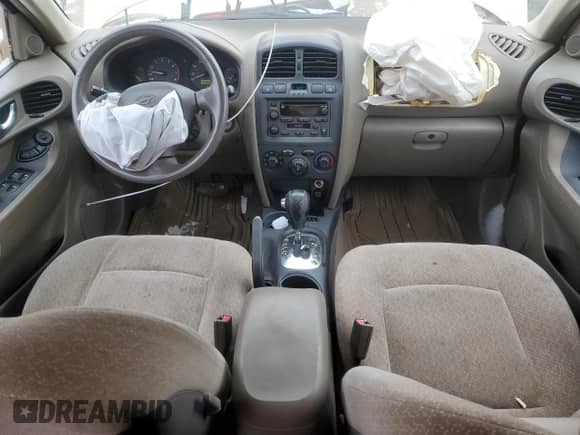 2004 Hyundai Santa Fe GLS z VIN KM8SC13D14U630432, wystawiony jako Copart lot #89356205 z przebiegiem 44 268 mil mil oraz Czysty tytuł • Clean title. Historia ofert i sprzedaży dostępna na DreamBid. Obrazek 8.